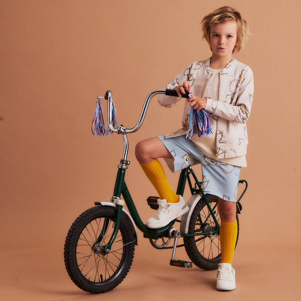 Boy wearing Dear Sophie organic Shorts- bike blue