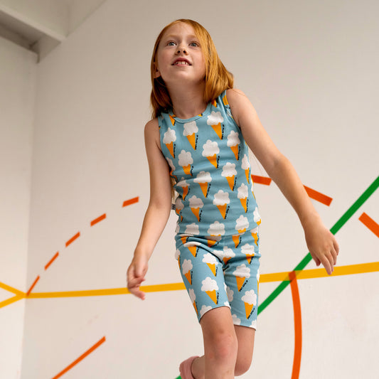 Girl wearing Don't Grow Up organic Ribbed bike shorts- blue ice cream