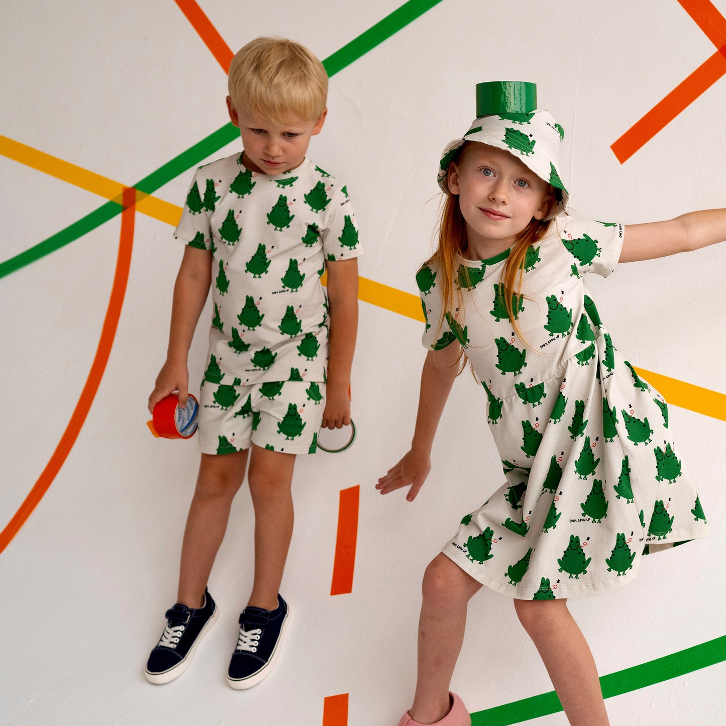 Boy wearing Don't Grow Up organic Shorts- frog