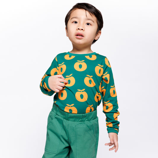 Boy wearing Småfolk Organic Long Sleeved Girls' T-shirt- Apples, Cedar Tree