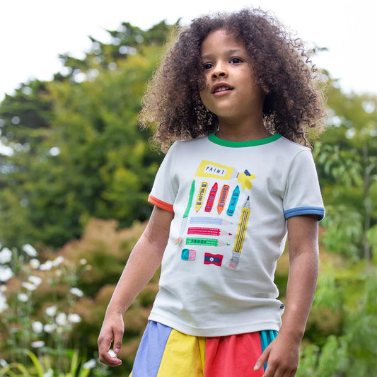 Girl wearing Frugi Organic Short-sleeved t-shirt- art supplies
