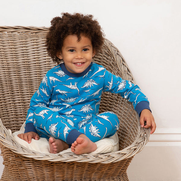 Baby wearing Kite organic Dinosaur pajamas