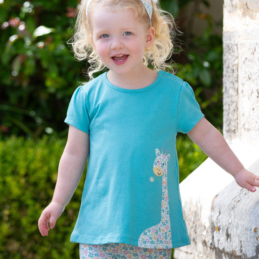 Girl wearing Kite Clothing Organic Short-sleeved tunic- giraffe appliqué