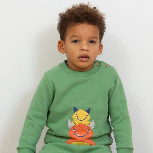 Boy wearing Kite organic Sweatshirt- monster hug