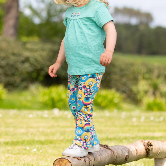 Girl wearing Kite organic Patchwork planet leggings