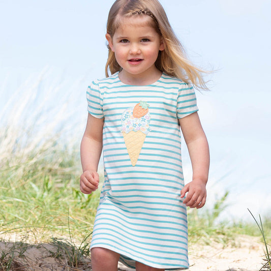Girl wearing Kite Clothing Organic Short-sleeved dress- strawberry sorbet appliqué