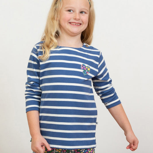 Girl wearing Kite organic Navy striped top