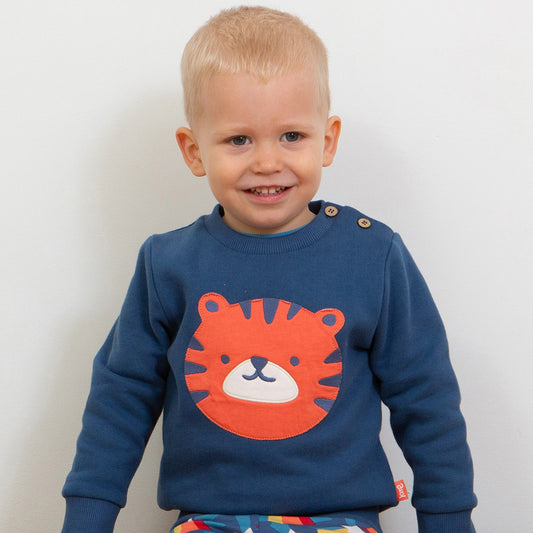 Boy wearing Kite organic Tiger appliqué sweatshirt