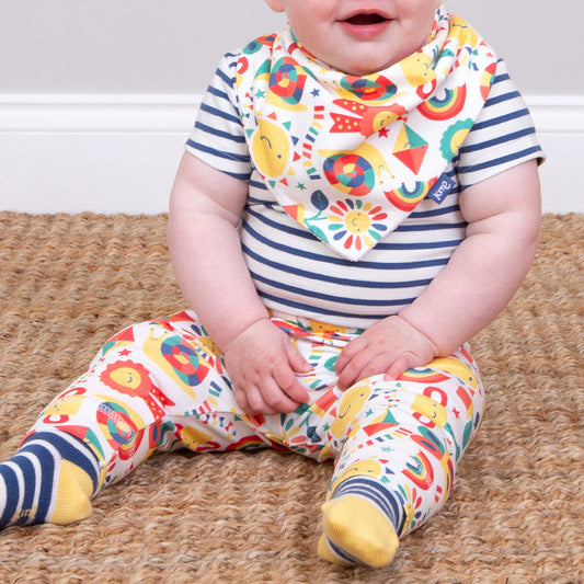 Baby wearing Kite organic Baby pants- sunshine & rainbows