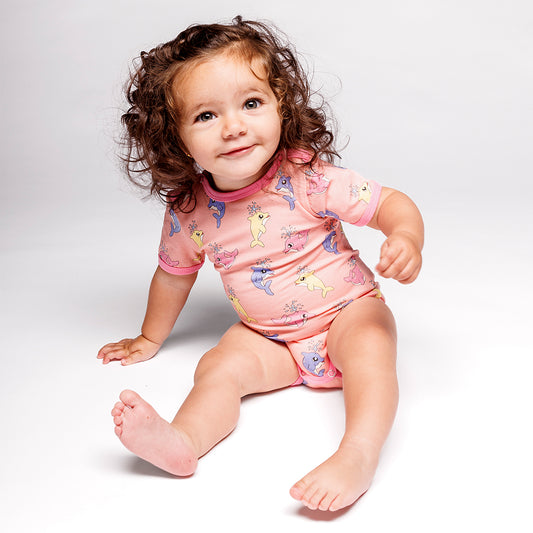 Baby wearing Short sleeved bodysuit- baby dolphins, blossom