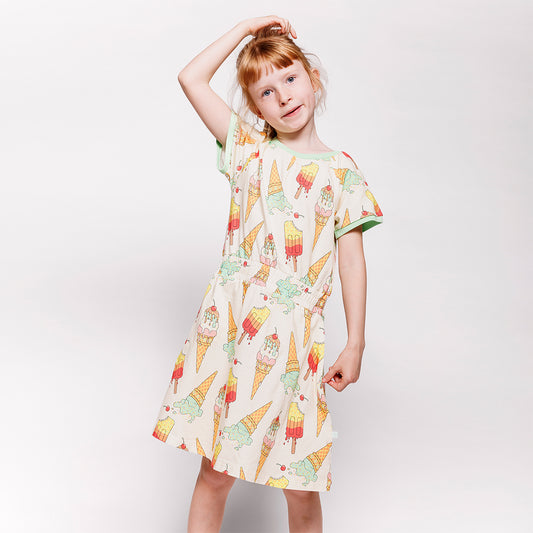 Girl wearing Smafolk organic Short sleeved dress- ice cream, marshmallow