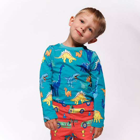 Boy wearing Smafolk organic Long sleeved t-shirt- dinosaurs, teal