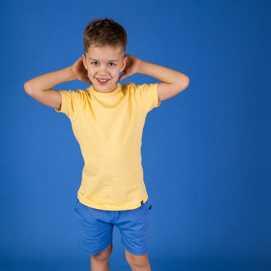 Boy wearing Mullido Shorts- blue