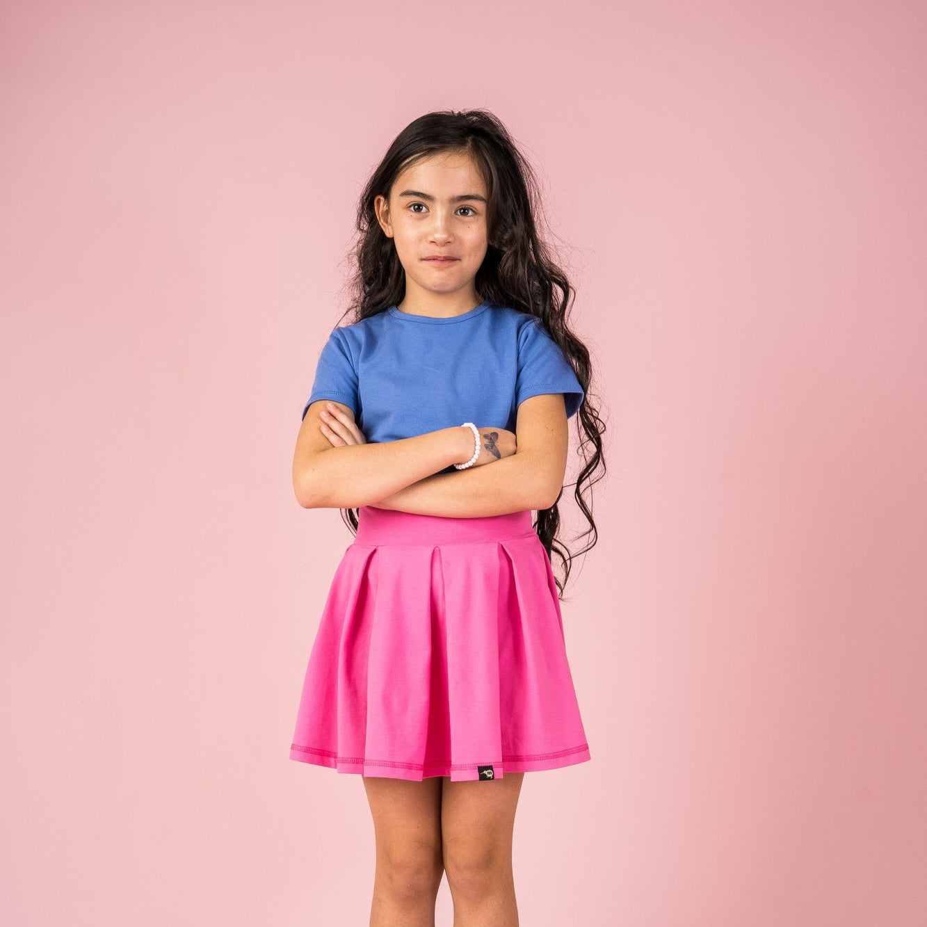 Girl wearing Mullido Skort- pink