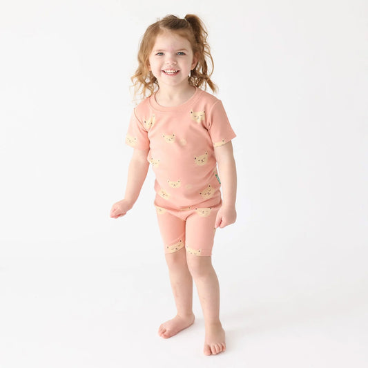Girl wearing Pigeon Organics Pajama set, short- cats