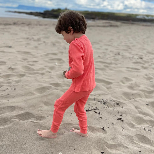 Boy wearing Slugs & Snails organic Waffle Set- Coral