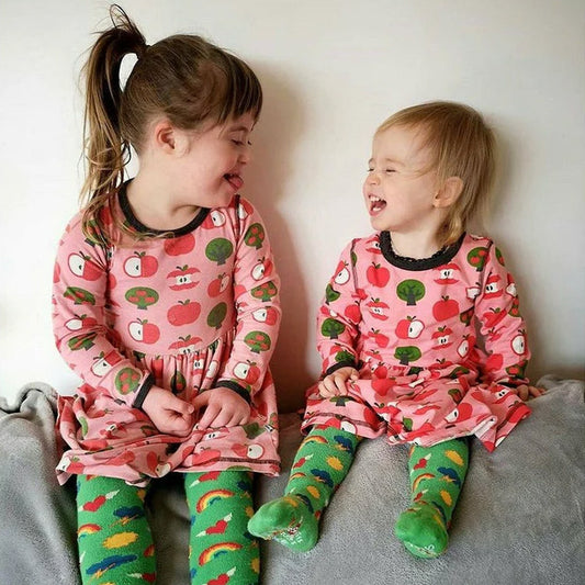 Girls wearing Slugs & Snails organic Retro patterned tights