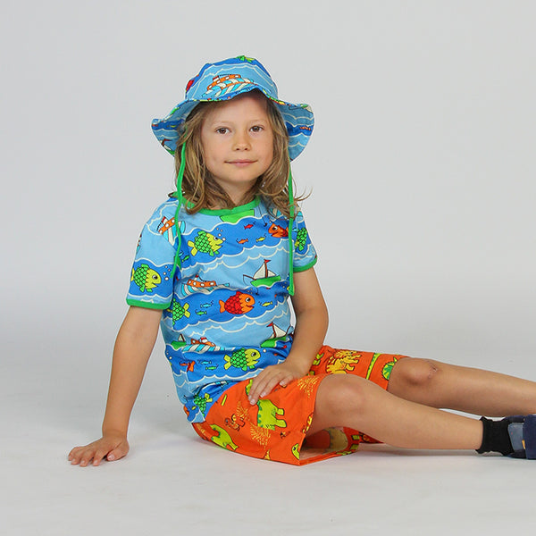 Boy wearing Smafolk organic Short sleeve t-shirt- boat & fish, blue grotto