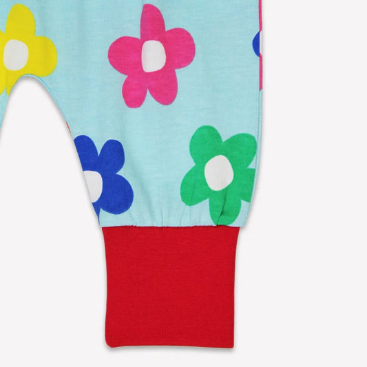 Toby Tiger organic Print pants- rainbow bloom, closeup