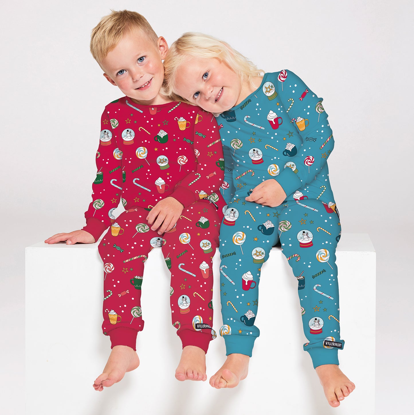 Girl wearing Villervalla organic Pajama set- winter magic, sky