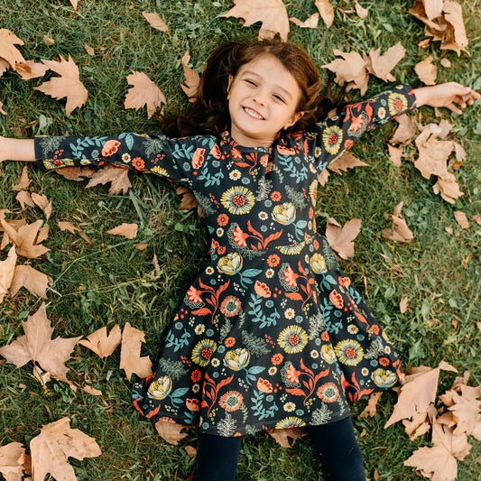 Girl wearing Long sleeve dress- cheerful flowers