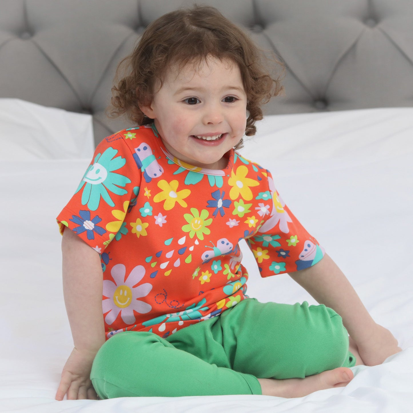 Girl wearing Piccalilly organic All over print t-shirt- flower power