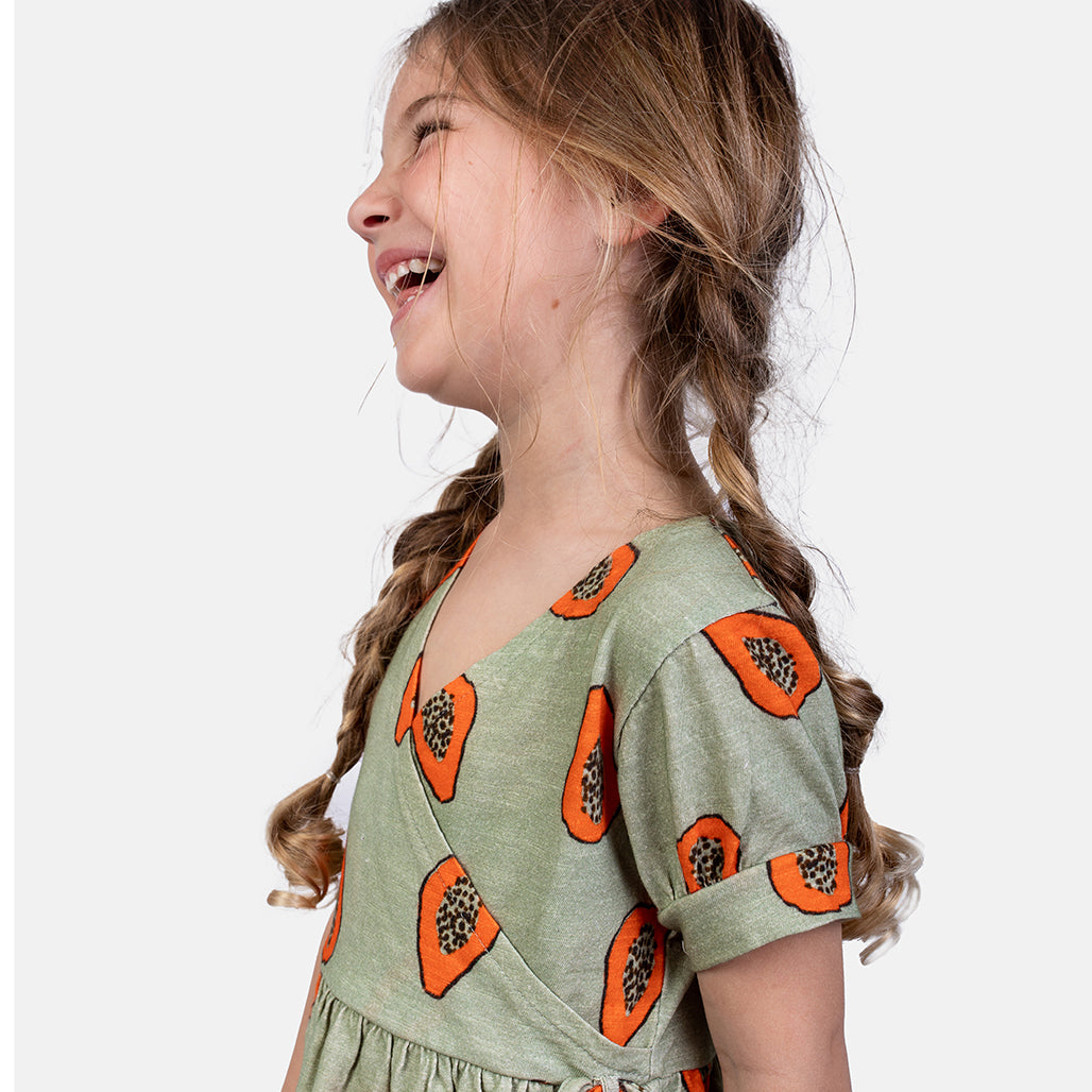 Girl wearing NAADA organic Papaya dress
