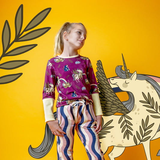 Girl wearing Raspberry Republic long sleeve t-shirt- unicorn crew