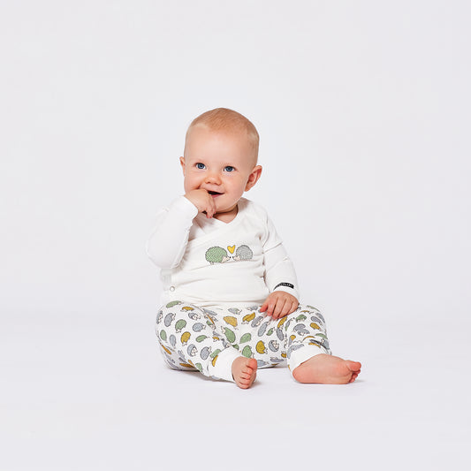 Baby wearing Villervalla organic Baby pants- hedgehog