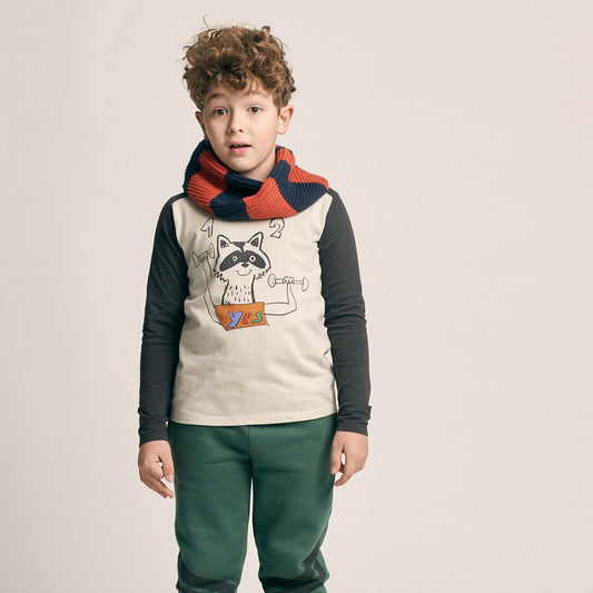 Boy wearing Naada (formerly nadadelazos) organic Racoon workout t-shirt