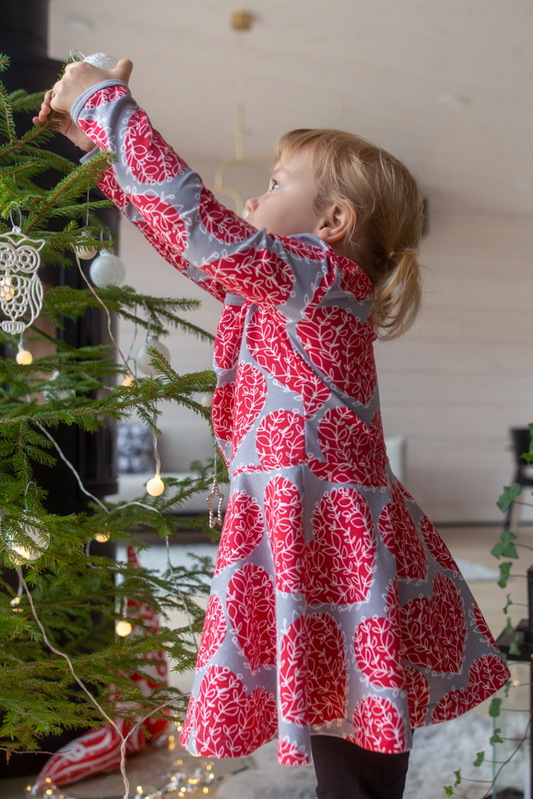 Girl wearing Sinna skater dress- gray & red heart