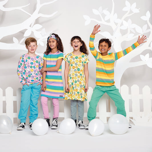 Boy wearing Villervalla organic Long sleeve top- bubble, bloom pink