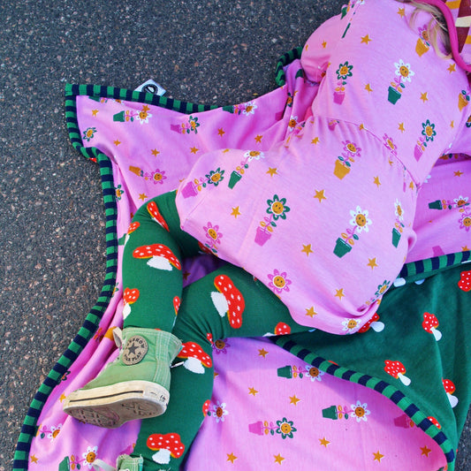 Girl wearing Moromini Long sleeve dress- level one