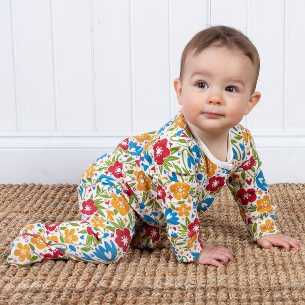 Baby wearing Kite Clothing Floral footed pajamas