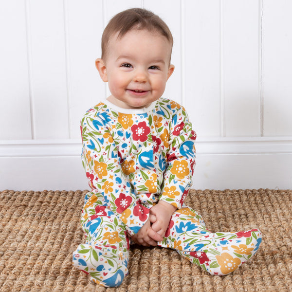 Baby wearing Kite Clothing Floral footed pajamas
