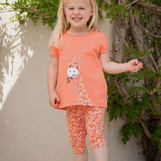 Girl wearing Kite Clothing organic Petal perfume cropped leggings