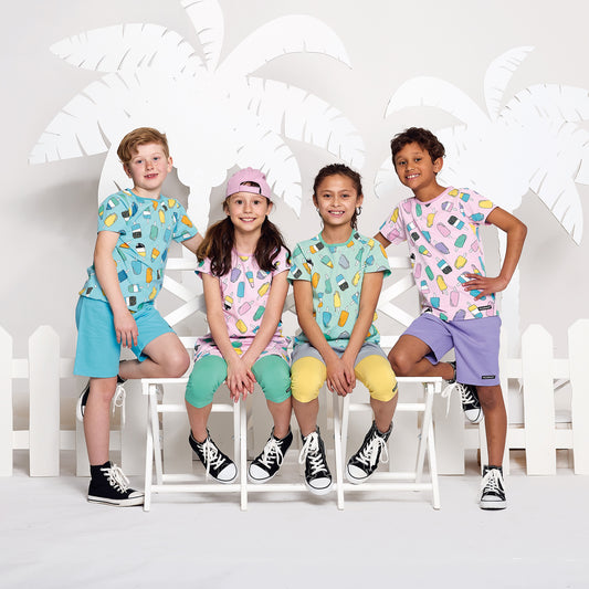 Girl wearing Villervalla organic Short sleeve dress- popsicles, bloom