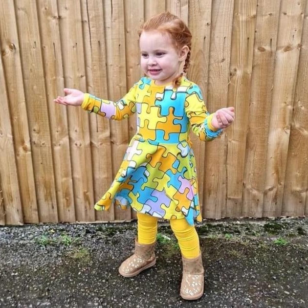 Girl wearing Naperonuttu Bell dress- puzzle