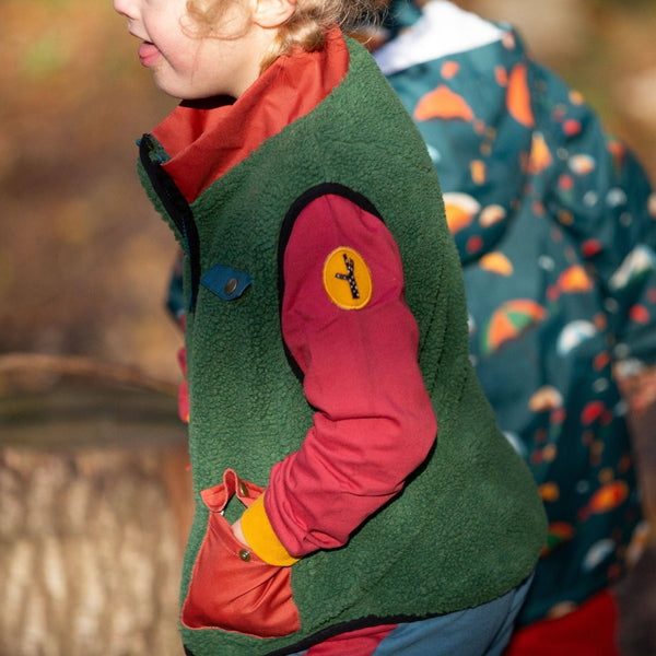 Boy wearing Little Green Radicals organic Raglan sweatshirt- soft red