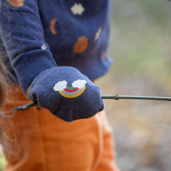 Child wearing Little Green Radicals Organic Knitted mittens- dreamy blue rainbow