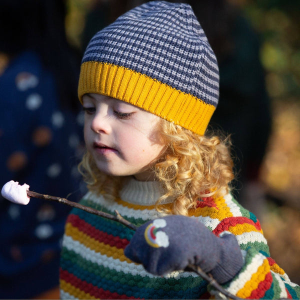 Boy wearing Little Green Radicals Organic Knitted hat- dreamy blue striped