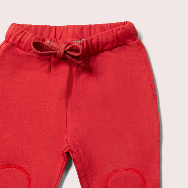 Little Green Radicals organic Joggers- soft red, closeup