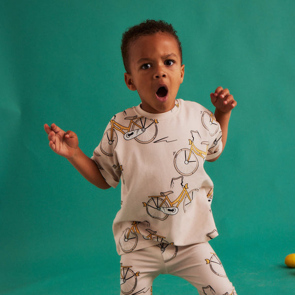 Boy wearing Dear Sophie organic Short sleeve t-shirt- bike white