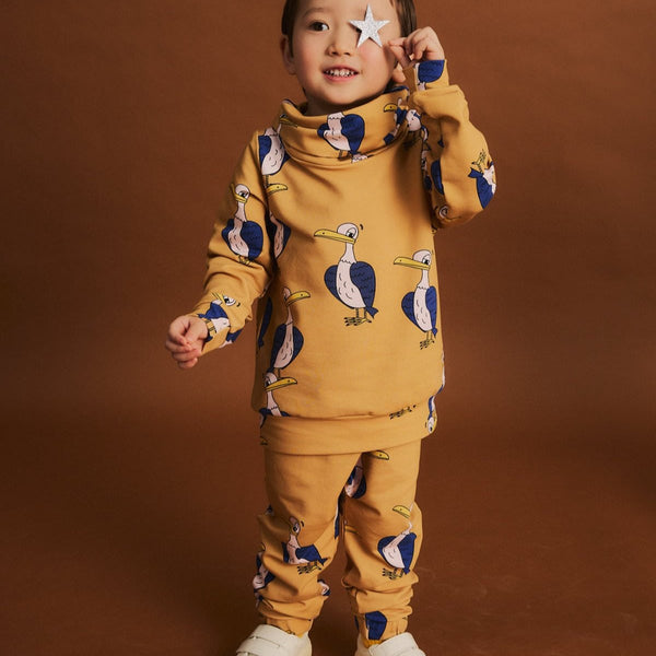 Boy wearing Dear Sophie Jogger pants- eagle yellow