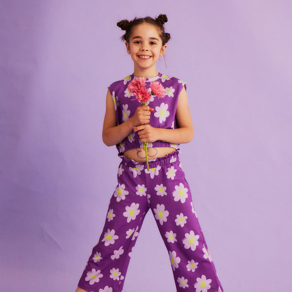 Girl wearing Dear Sophie organic Culottes- flowers violet