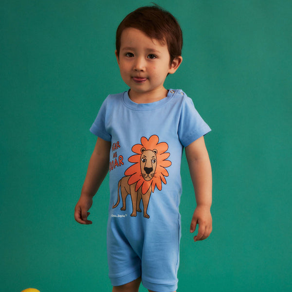 Boy wearing Dear Sophie organic Short romper- lion blue