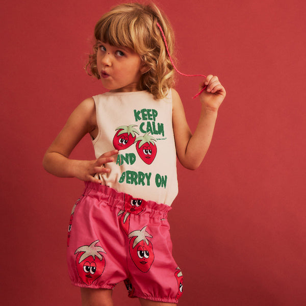 Girl wearing Dear Sophie organic Shorts- strawberry pink