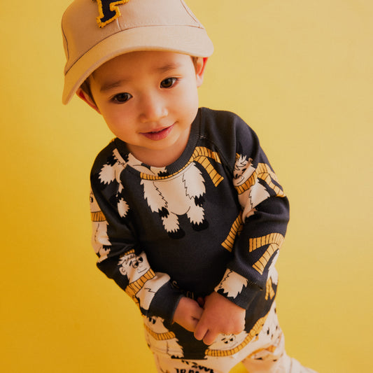 Boy wearing Dear Sophie organic Ribbed long sleeved top- dark yeti
