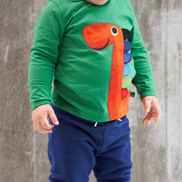 Boy wearing Fred's World organic Long sleeve top- dinosaur appliqué