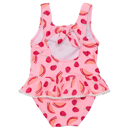 Pink children's swimsuit with watermelon and strawberry pattern on a pink background.